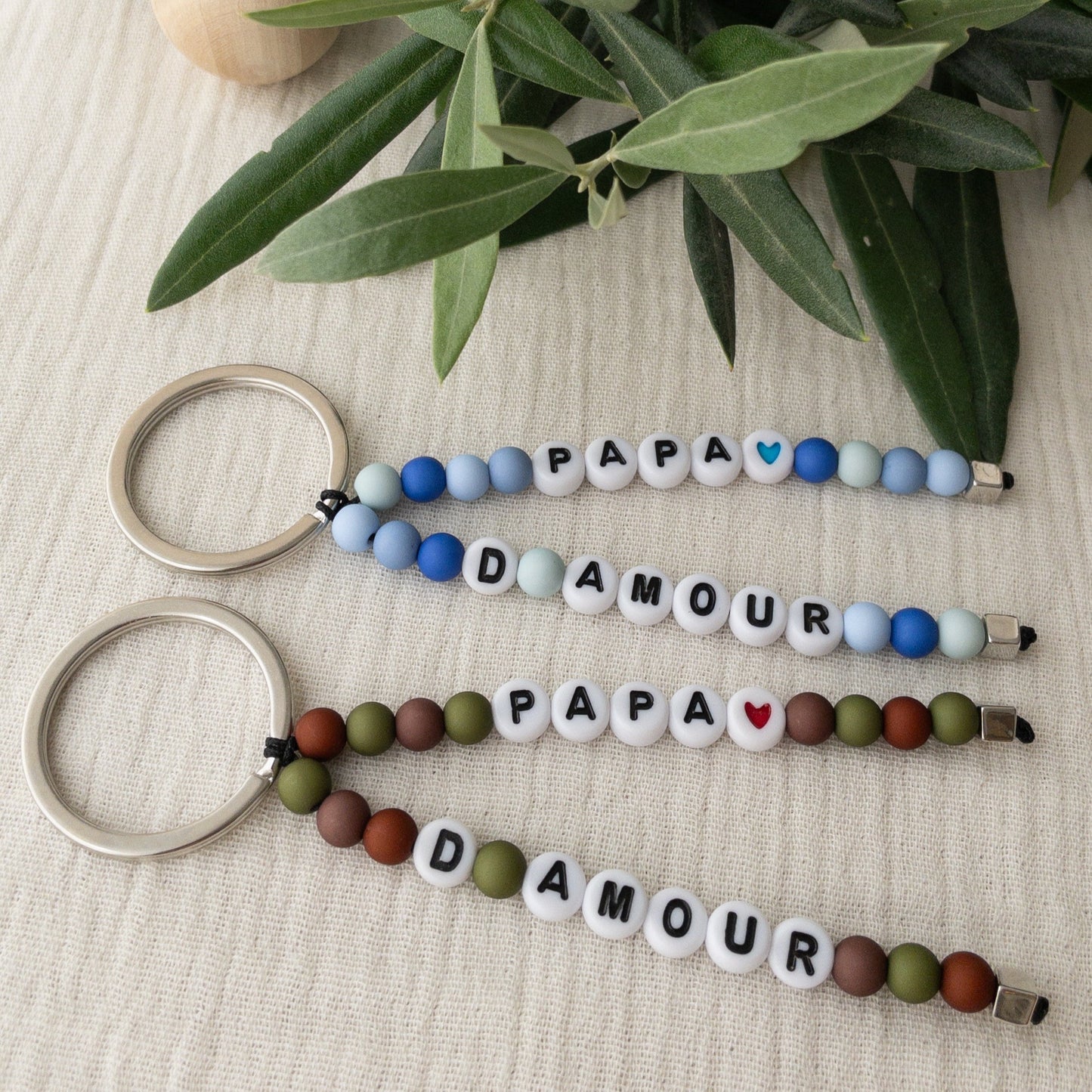 Porte clés personnalisé perles rondes masculin