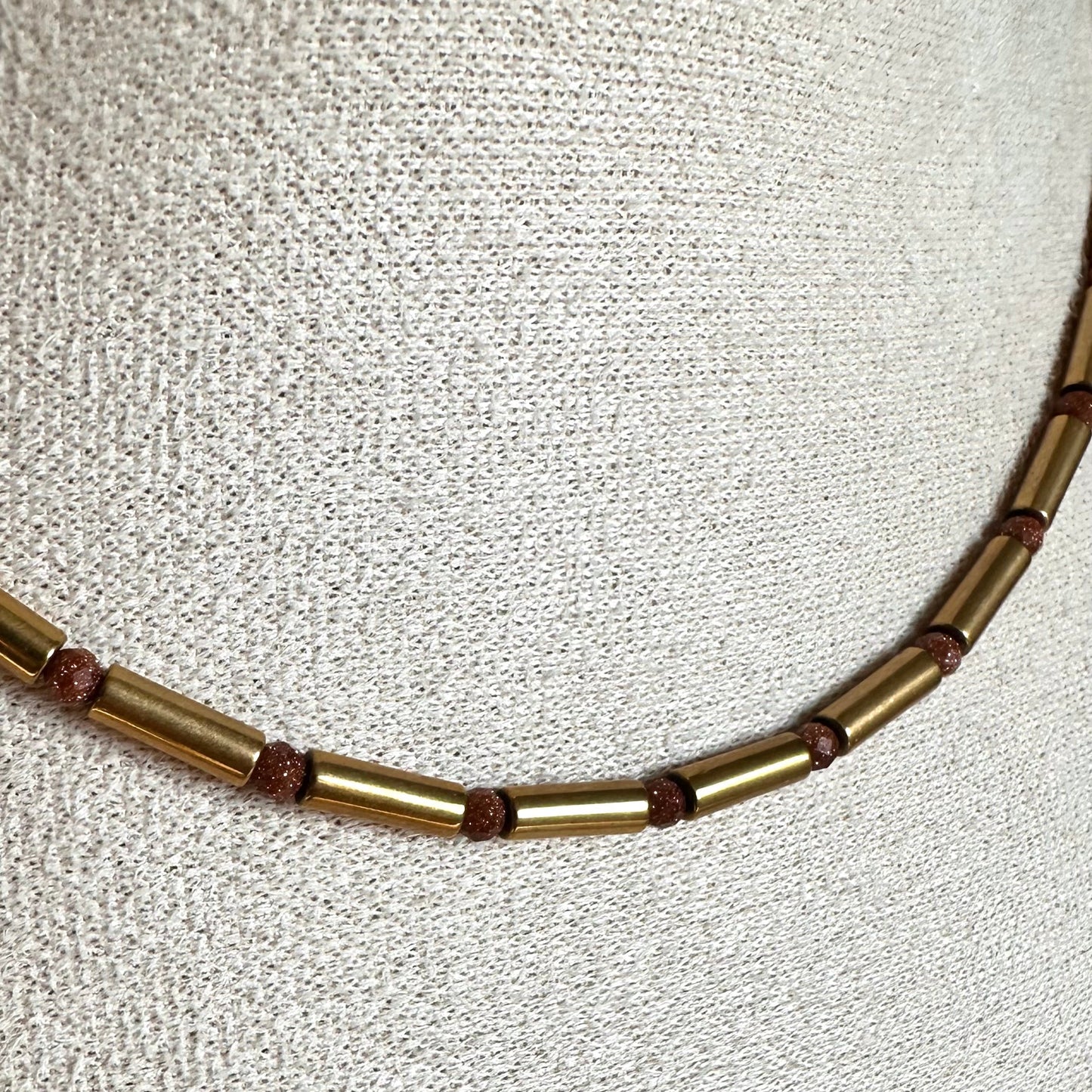 Collier perles tube