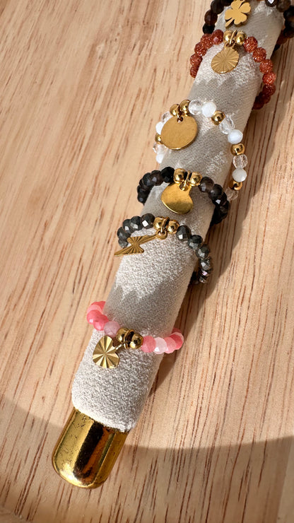 Bague perles et breloque