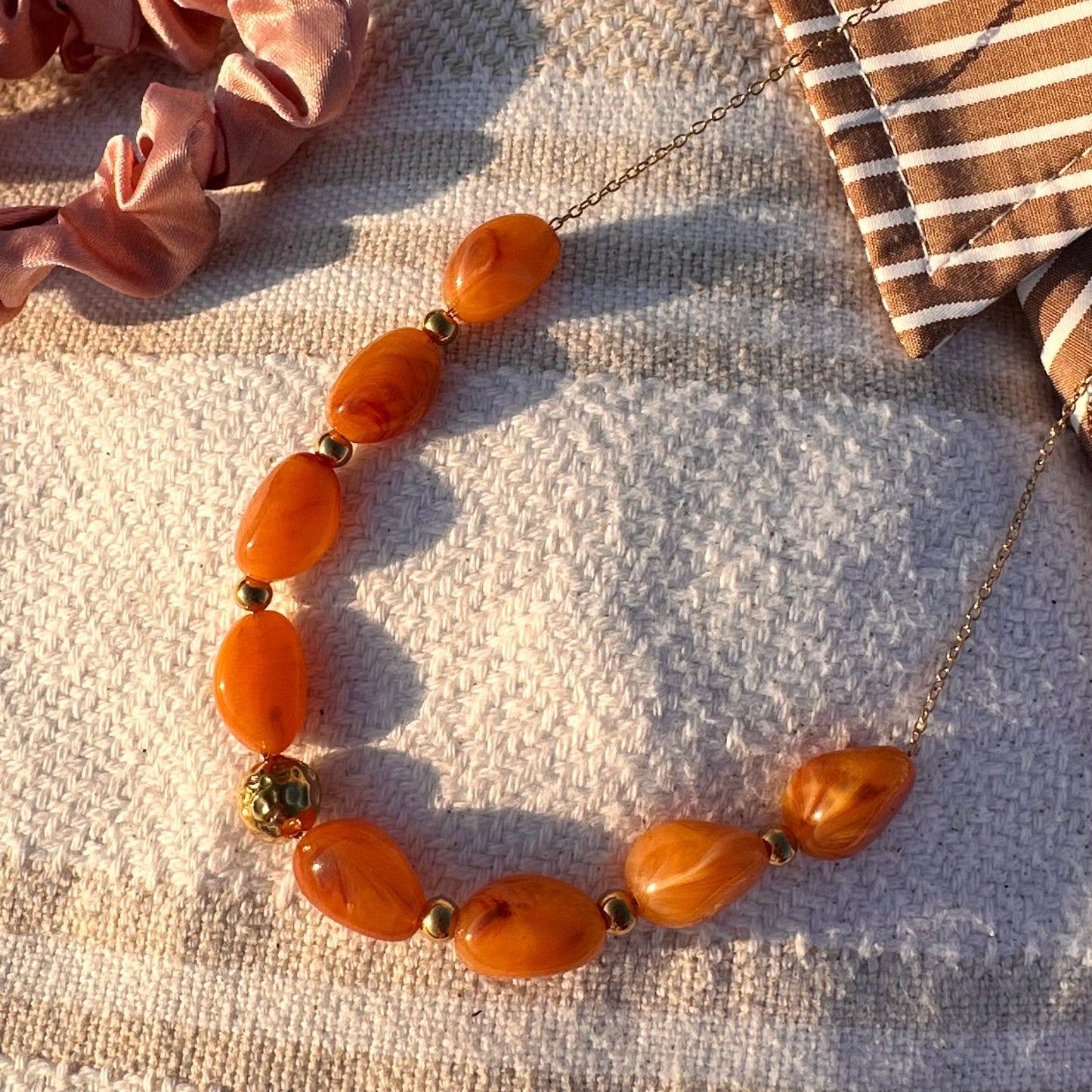 Collier perle résine