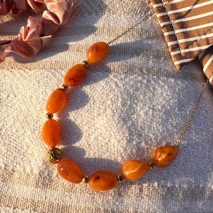 Collier perle résine