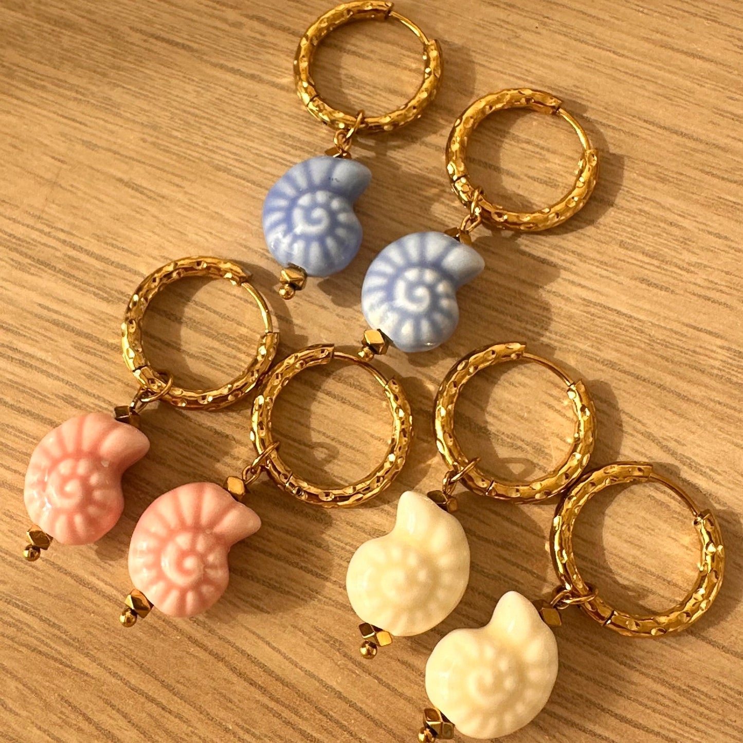 Boucles escargot céramique