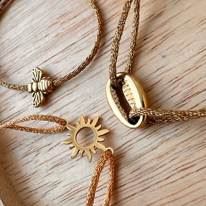 Bracelet cordon pailleté doré