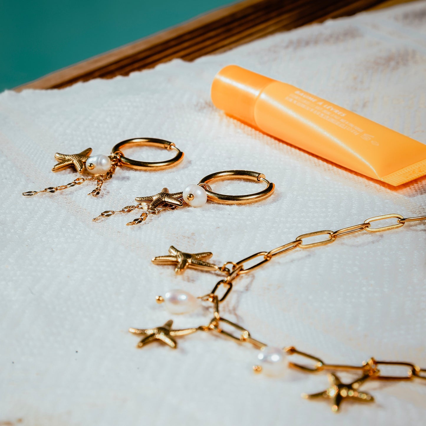 Collier breloques étoiles de mer